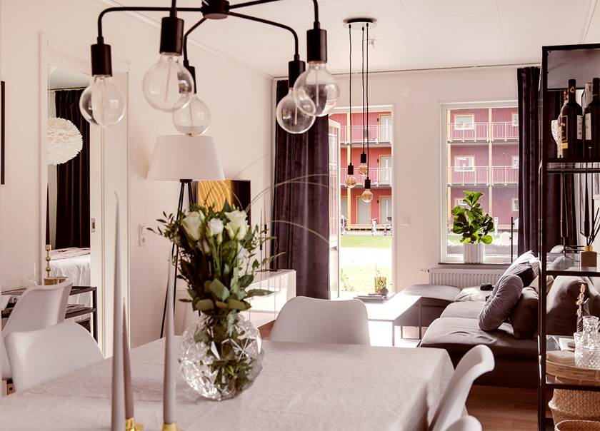 Kitchen living room with flowers on table Kitchen living room with flowers on table