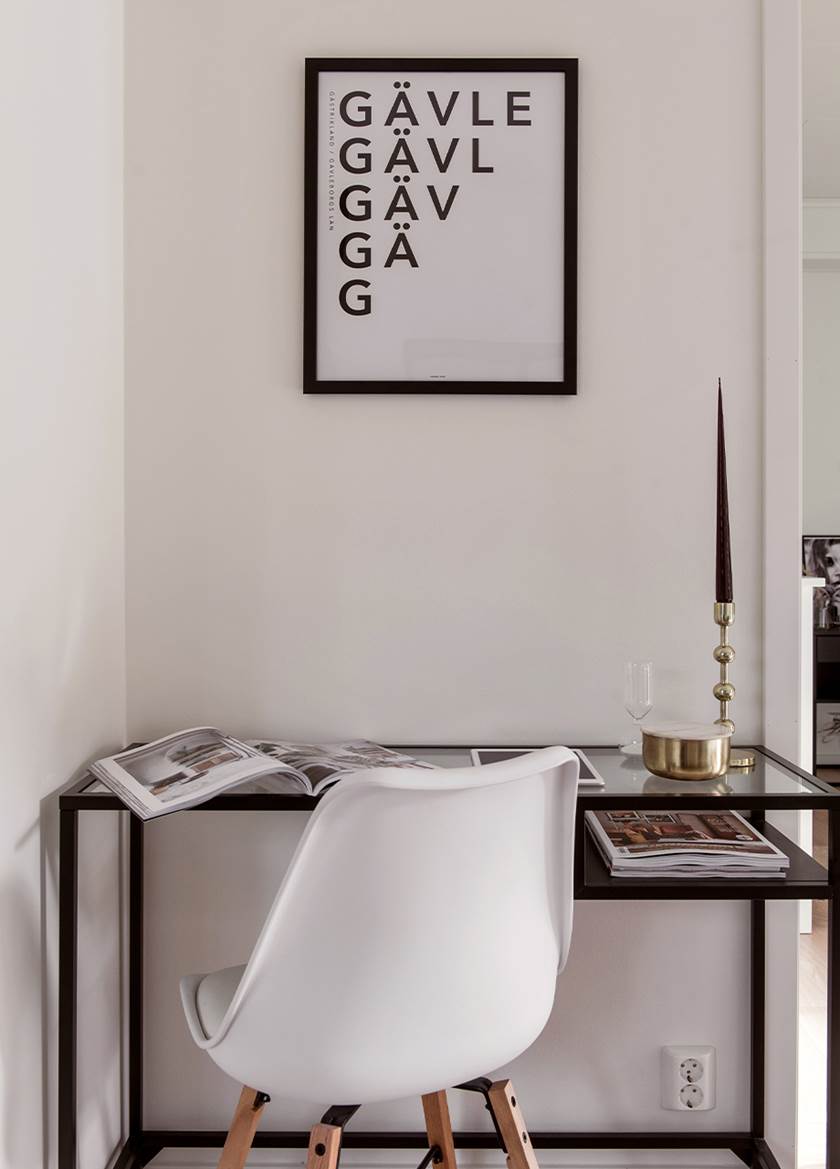 Black framed desk with white chair
