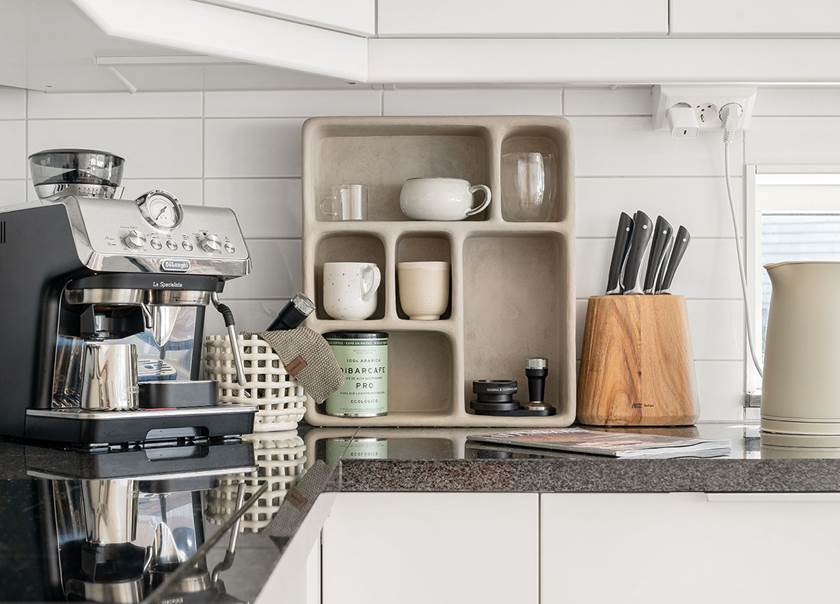 coffee machine_cups_knives_kettle_on_kitchen counter. coffee machine_cups_knives_kettle_on_kitchen counter.