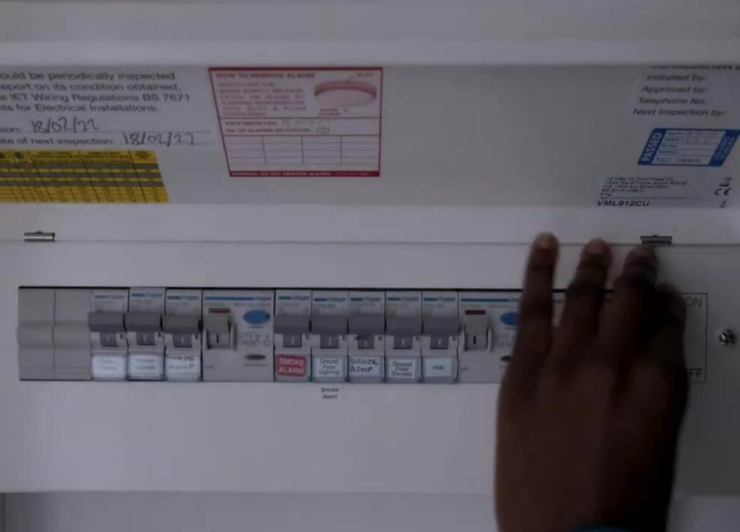 Hans managing the electricity switches. 