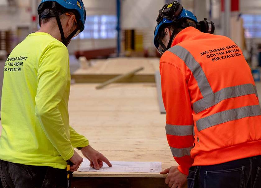 Two employees in factory. Two employees in factory.