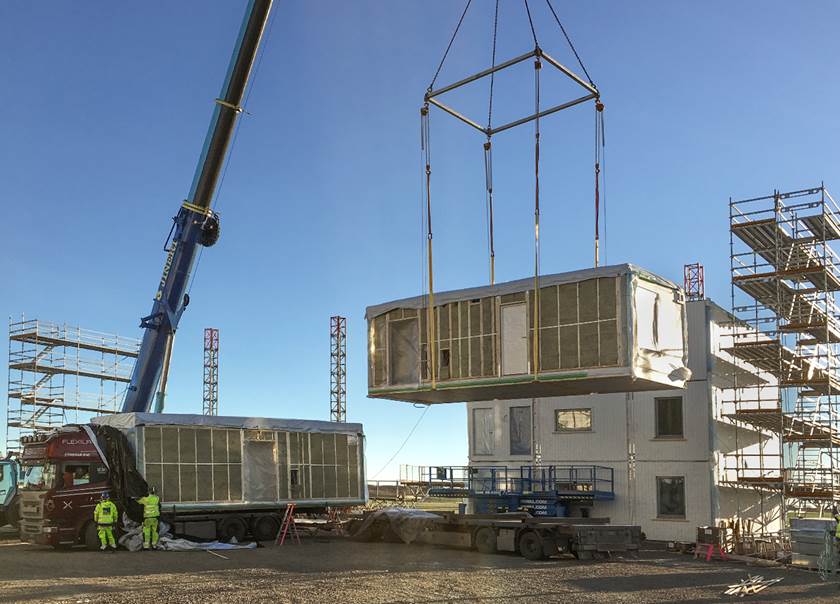 House module is lifted into place at the BoKlok construction site