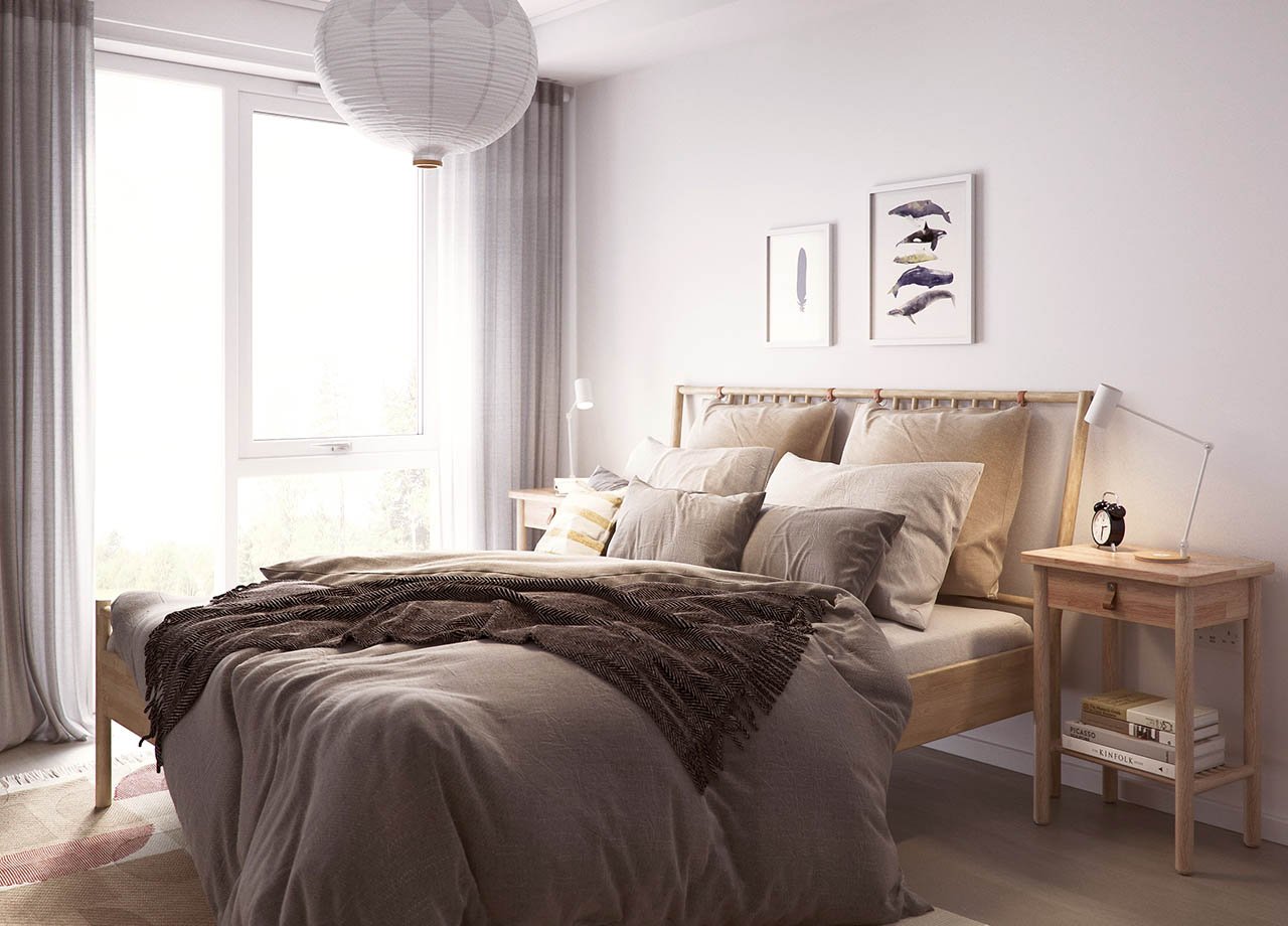 Bedroom with double bed, brown blanket and nighstands in wood.