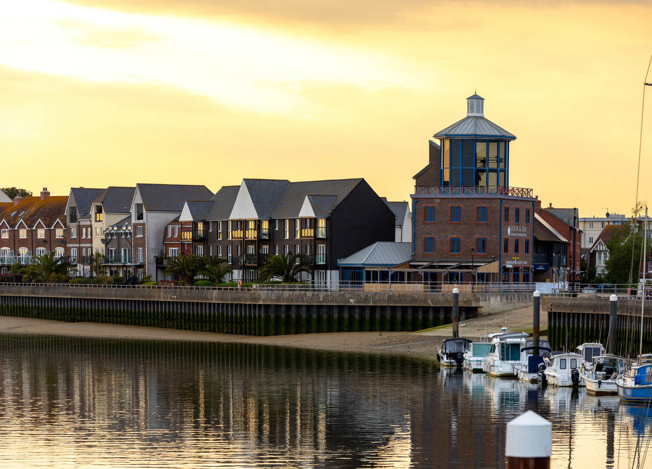 Littlehampton harbour with boats and buildings.