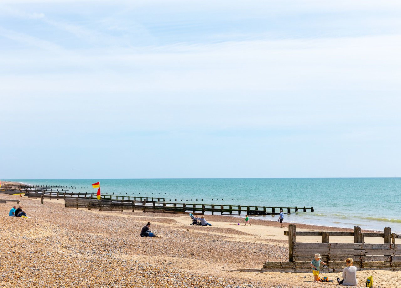 People on beach in Littlehamphton.